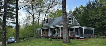 Private mountain retreat with trout pond on 17+ acres of meadow and forest.