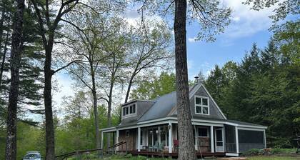 Private mountain retreat with trout pond on 17+ acres of meadow and forest.