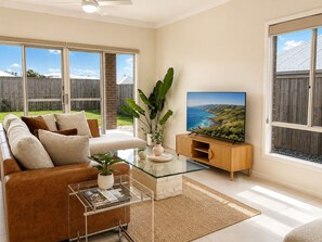 Living area - Mountain Breeze Retreat - Brand New 4BR Home (Morayfield)