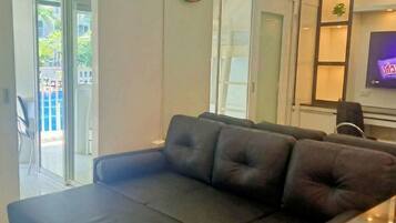 Condo, Balcony, Pool View | Living area