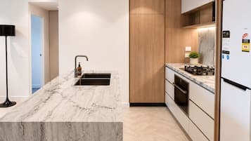 Coffee/tea maker, fridge, microwave, oven