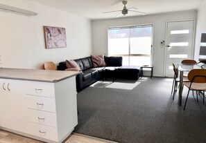 Apartment, 2 Bedrooms | Living area | 54-inch Smart TV with digital channels, toys, streaming services