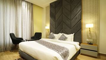 Executive Double Room, City View | In-room safe, desk, laptop workspace, blackout drapes