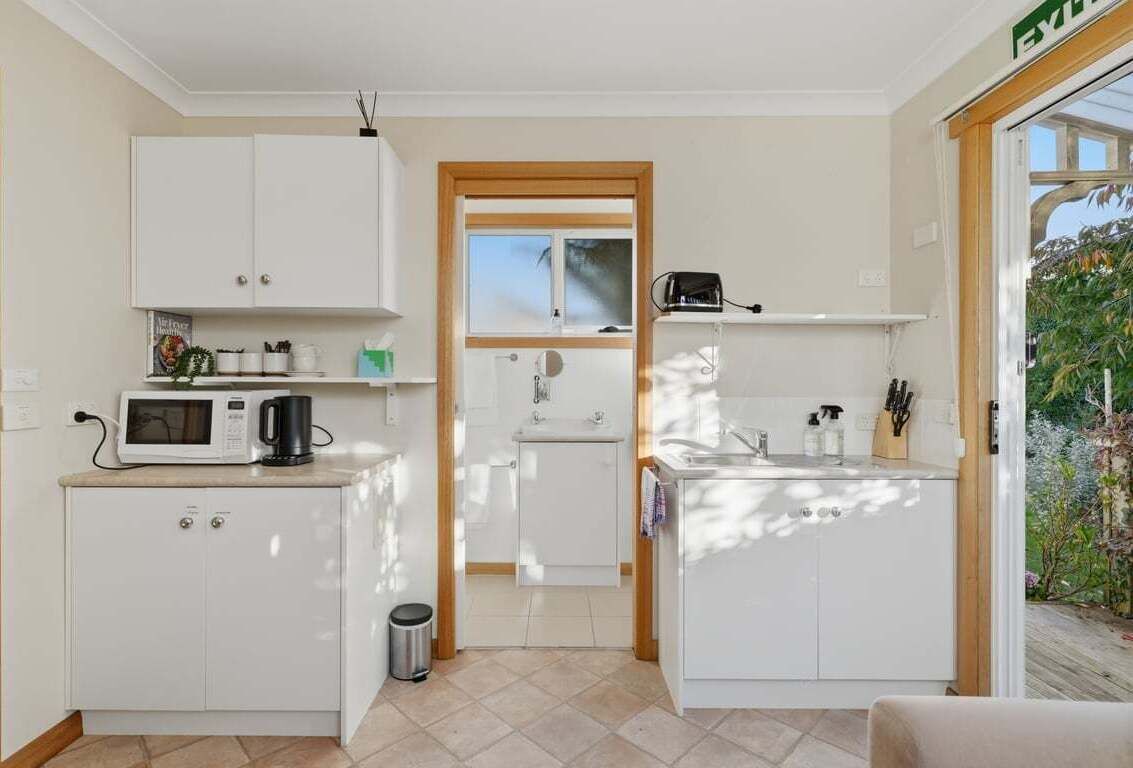 Microwave, electric kettle, toaster, dining tables