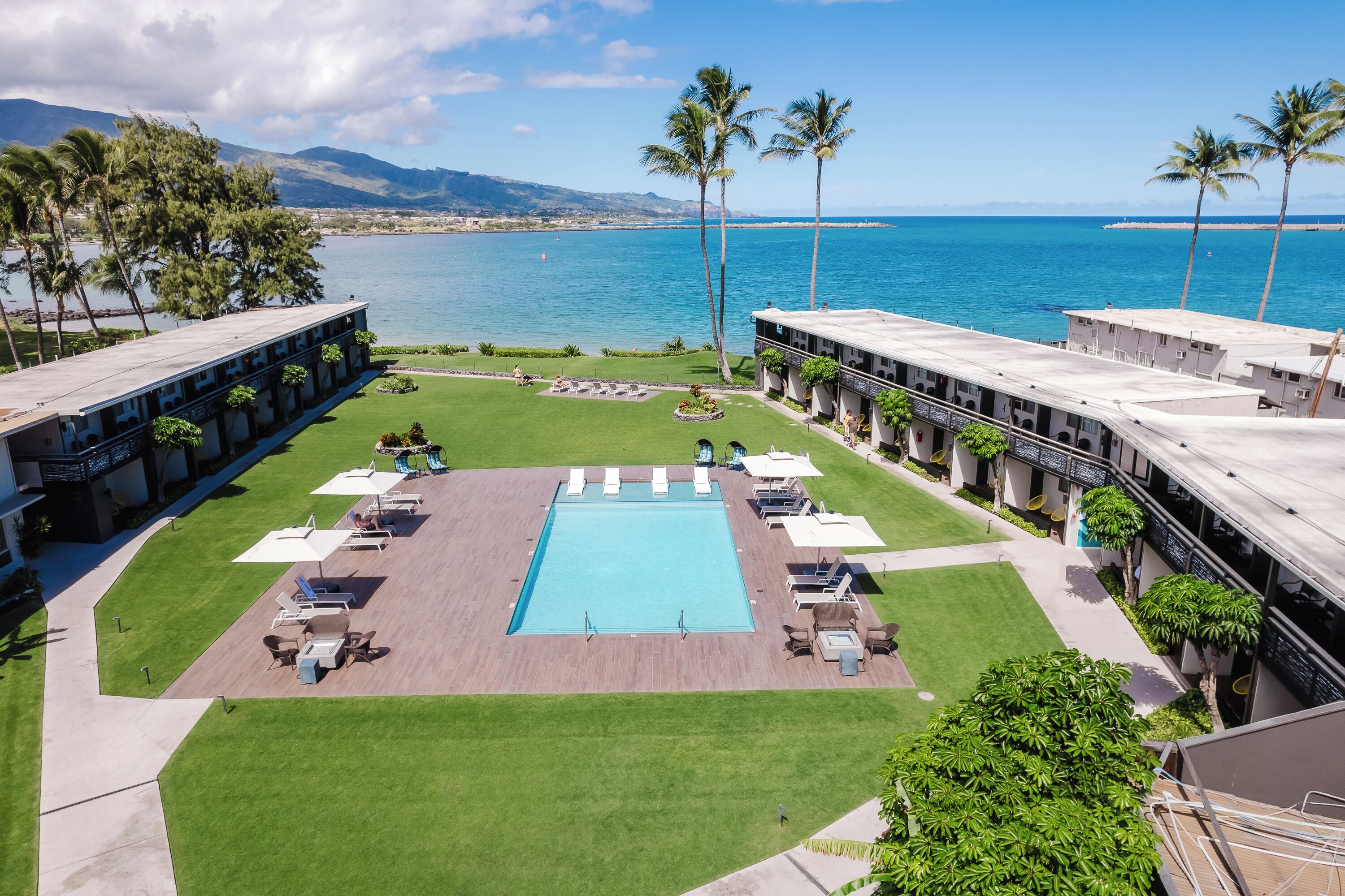 Soak up oceanfront sunshine beside the resort-style pool oasis.
