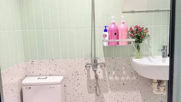 Hair dryer, slippers, towels, soap