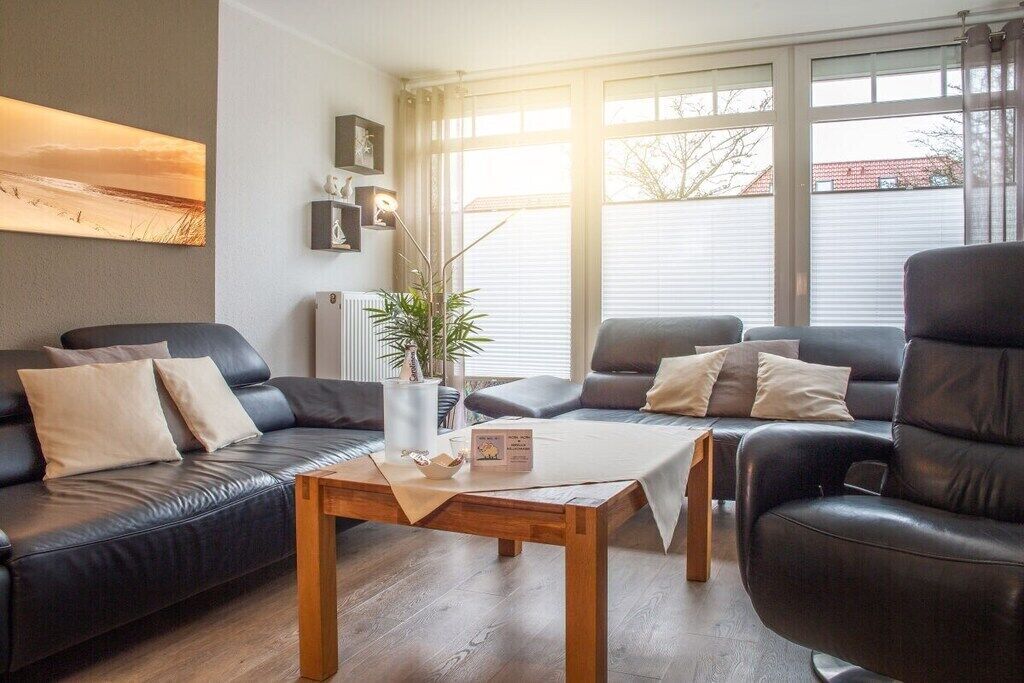 Smart-tv, dvd-afspiller, bøger, stereoanlæg