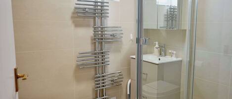 Shower, hair dryer, shampoo