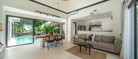 Luxury Villa, Pool View | Living area | 50-inch Smart TV with digital channels