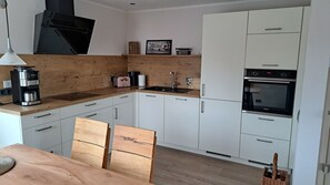 Private kitchen - Vacation home Bohrmann, quiet, idyllic location on the outskirts of the Donnersberg district (Rüssingen)