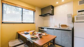 Fridge, microwave, stovetop, cookware/dishes/utensils