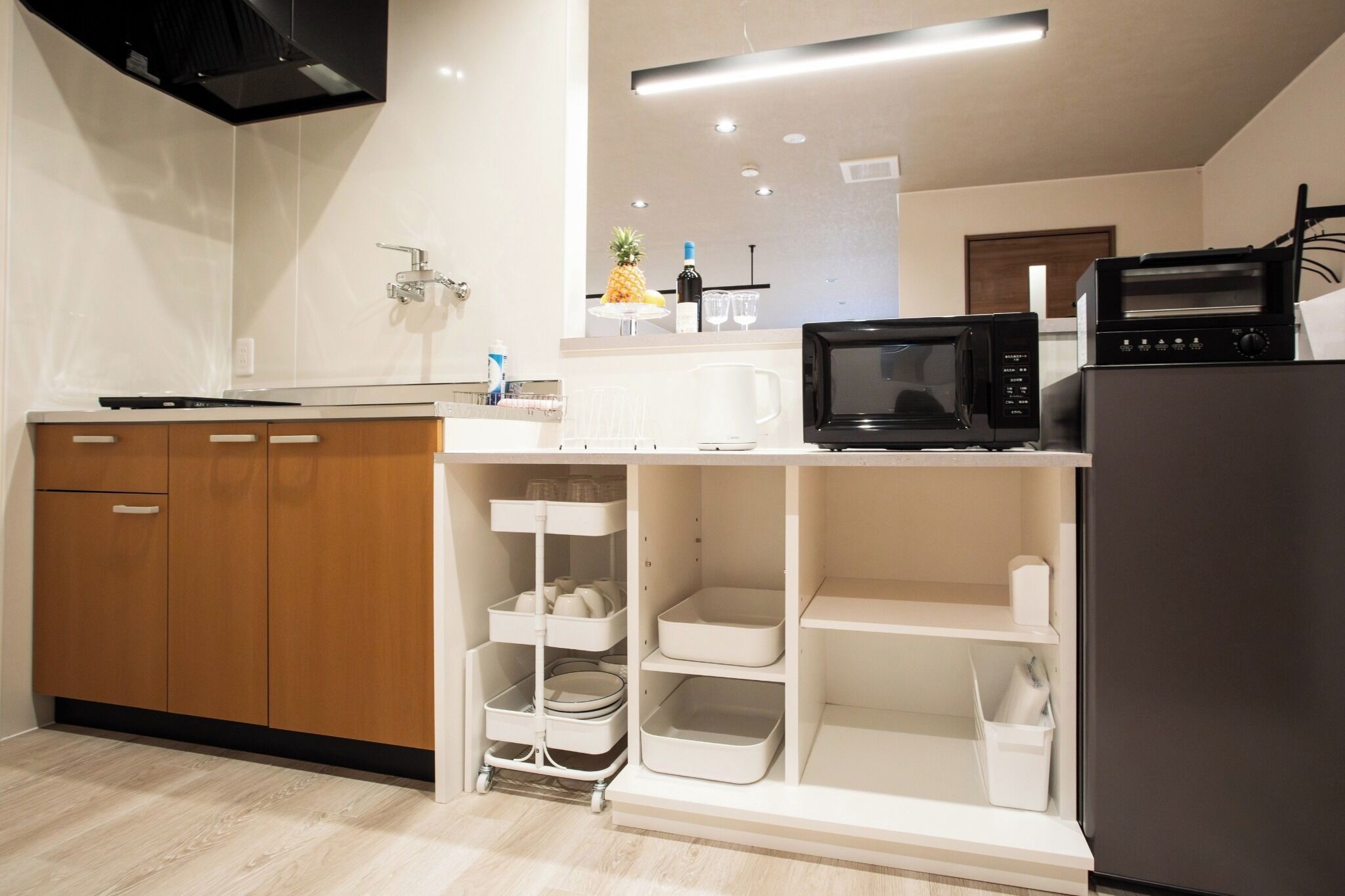 Fridge, microwave, cookware/dishes/utensils