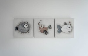Three square artworks with abstract animal designs. - Modern and Bright Studio in Central Sheffield (Sheffield)