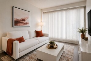 Living area - Cozy 1BR Downtown Toronto Suite with CN Tower Views! (Toronto)
