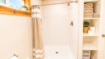 Hair dryer, towels, soap, toilet paper