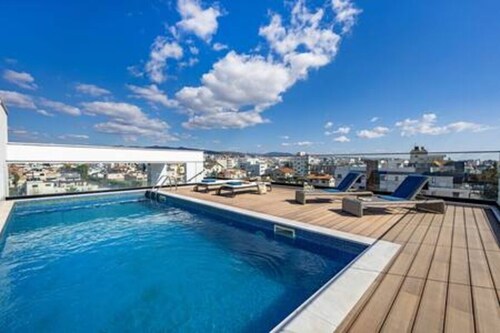 103 Sfiggos - City View Balcony & Rooftop Pool