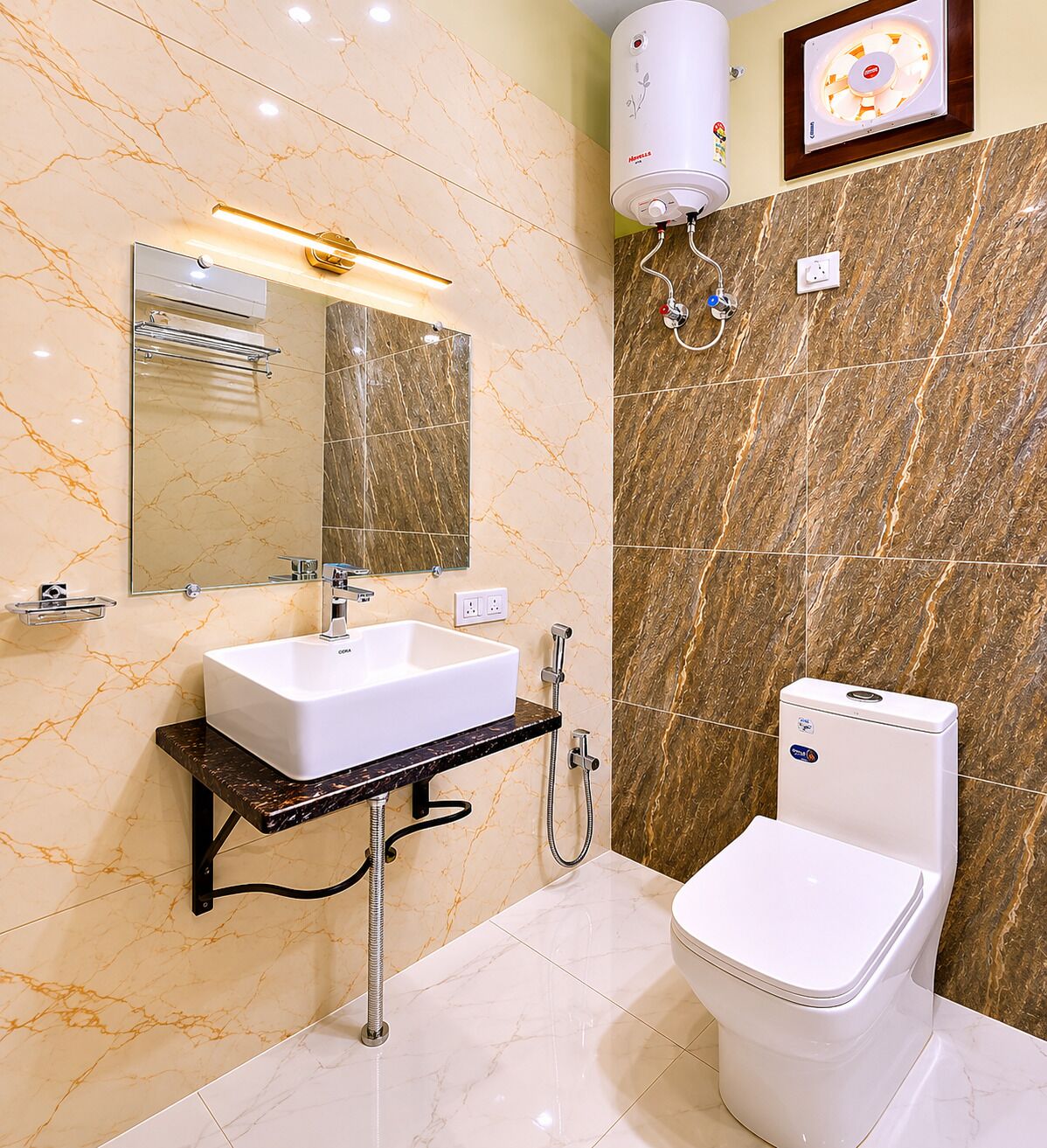 A bathroom with a white sink, a mirror, a toilet, a towel rack, and a wall-mounted heater.
