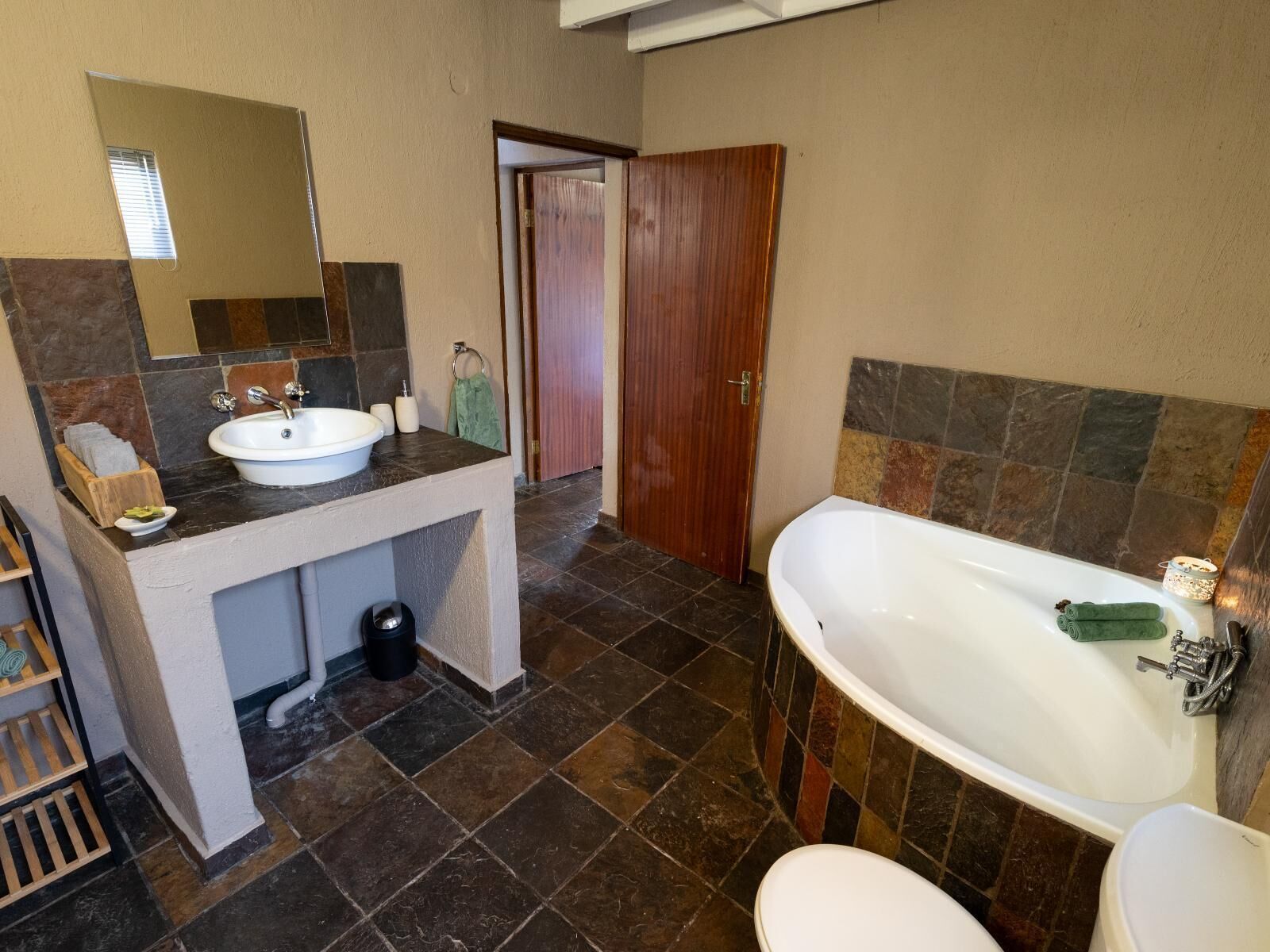 Shower, hair dryer, towels, toilet paper