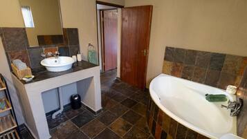Shower, hair dryer, towels, toilet paper