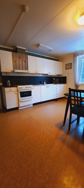 Apartamento, vista para o jardim | Cozinha privada