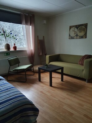 Apartamento, vista para o jardim | Área de estar