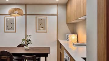 Mini-fridge, microwave, cookware/dishes/utensils