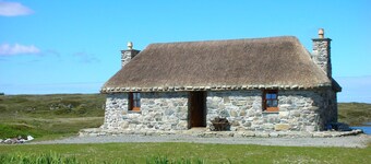 5 Star Traditional Hebridean Thatched Cottage Isle of South Uist awaits you