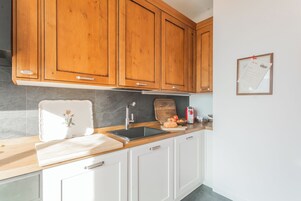 Villa (2 Bedrooms) | Private kitchen | Microwave, oven, espresso maker, highchair