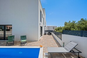 Villa (Three Bedroom Villa with Outdoor Swim) | Outdoor pool | Seasonal outdoor pool, sun loungers