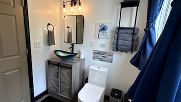 Hair dryer, towels, soap, shampoo