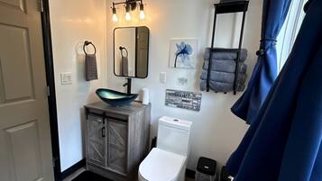 Hair dryer, towels, soap, shampoo