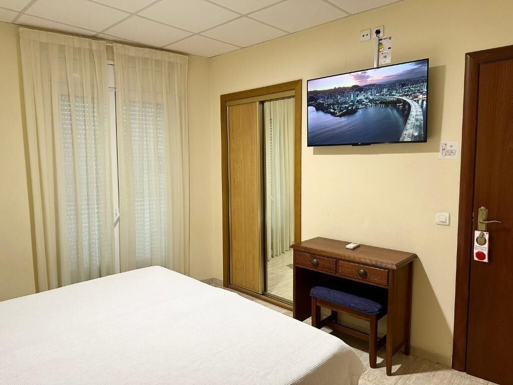 Double or Twin Room, Balcony, City View | Iron/ironing board, free WiFi, wheelchair access