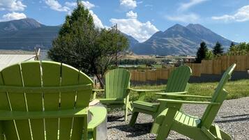 Outdoor seating with a mountain view.