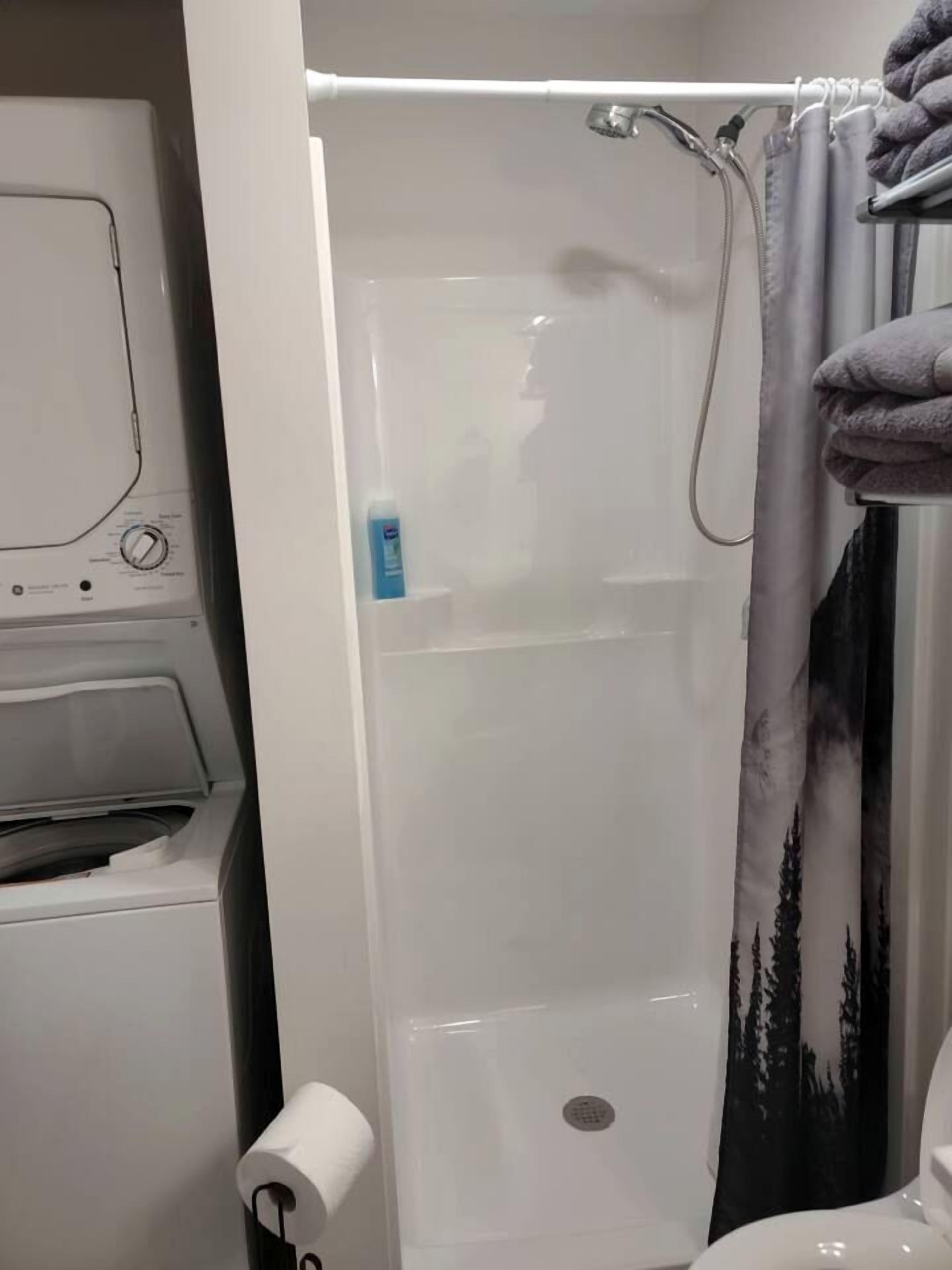 Hair dryer, towels, soap, shampoo