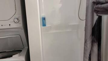 Hair dryer, towels, soap, shampoo