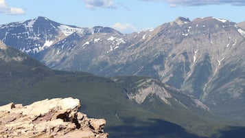 A mountainous landscape with rocky terrain and a valley.
