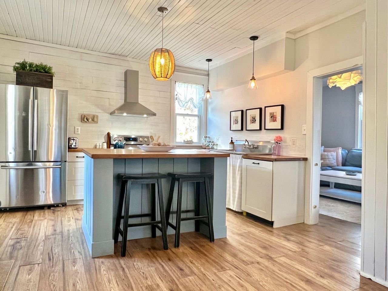 Fridge, microwave, stovetop, dining table
