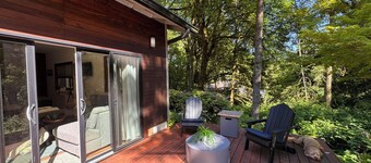 Nestled in the trees, this contemporary and cozy guesthouse is comfy and quiet,