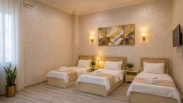 Triple Room | Iron/ironing board, free WiFi, bed sheets