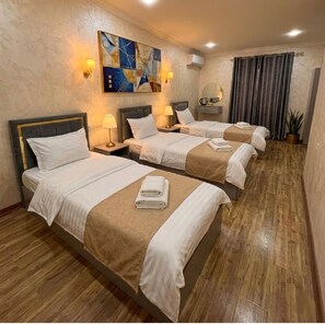 Een strijkplank/strijkijzer, gratis wifi, beddengoed