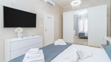 3 habitaciones, tabla de planchar con plancha, wifi y ropa de cama