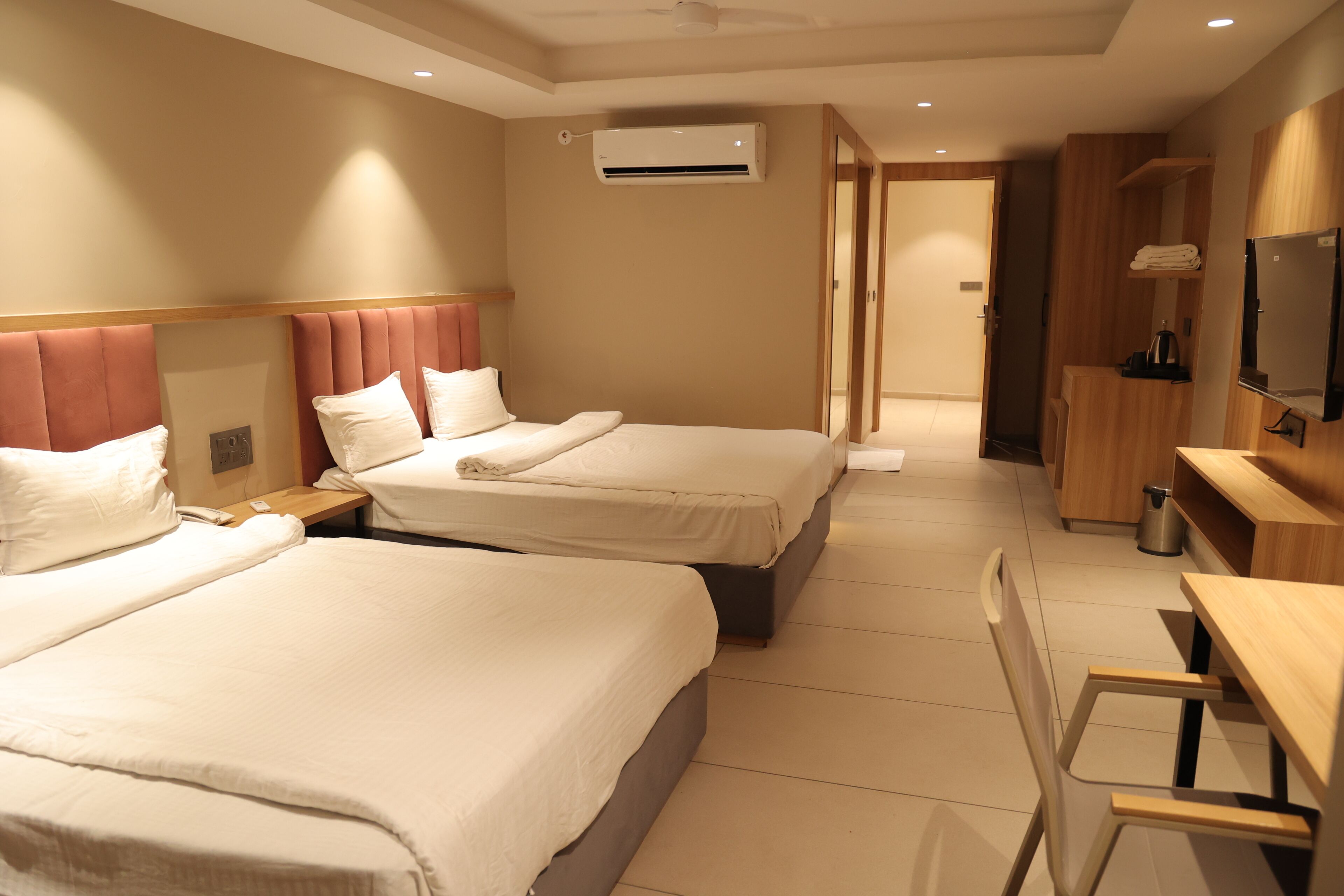 Desk, laptop workspace, free WiFi, bed sheets