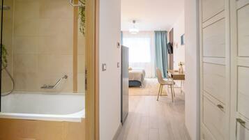 Separate tub and shower, free toiletries, hair dryer, towels