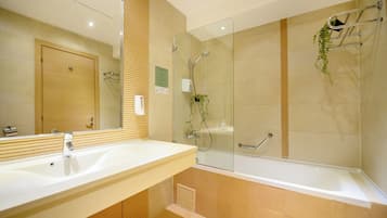 Separate tub and shower, free toiletries, hair dryer, towels