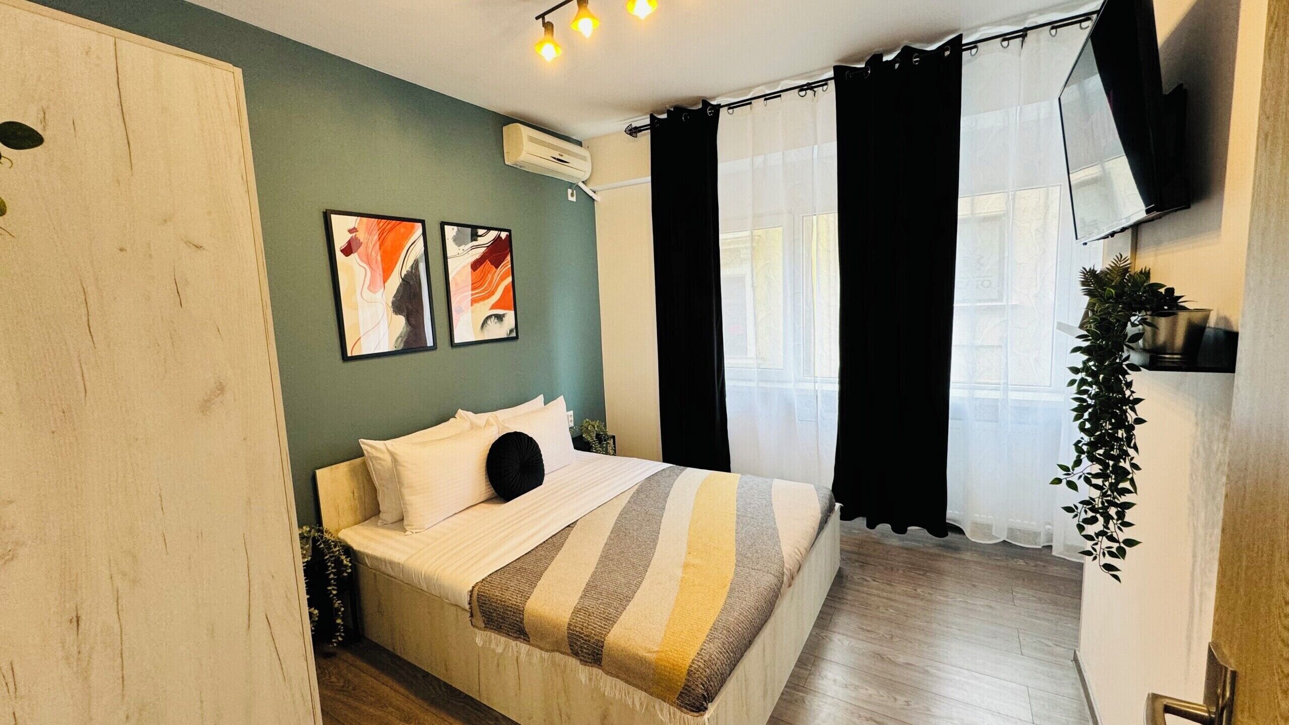 Apartamento conforto, 1 cama de casal e sofá-cama, para não fumantes | Cortinas blackout, ferros/tábuas de passar roupa, Wi-Fi de cortesia
