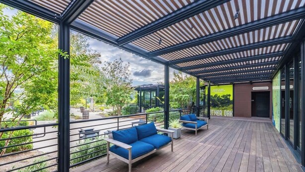 An outdoor deck with blue sofas and a pergola structure. - @ Marbella Lane - Designer Dream Oasis Family Home (San Juan Capistrano)