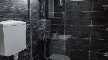 Economy Twin Room, City View | Bathroom