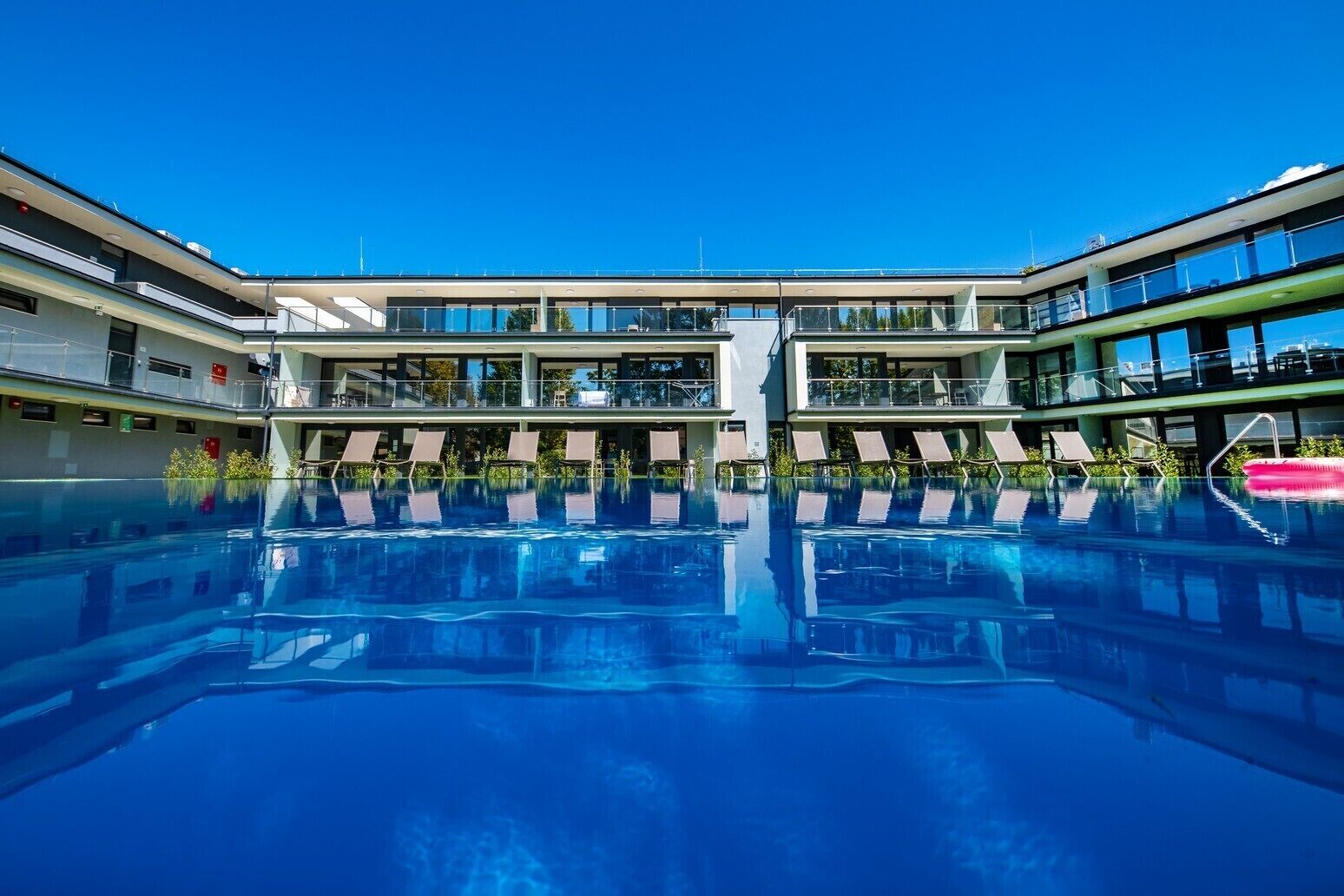 Seasonal outdoor pool, pool loungers