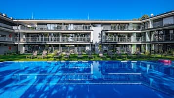 Seasonal outdoor pool, pool loungers