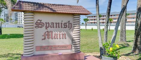 A sign with 'Spanish Main' and '5-35 Sunflower' indicating a location or area.